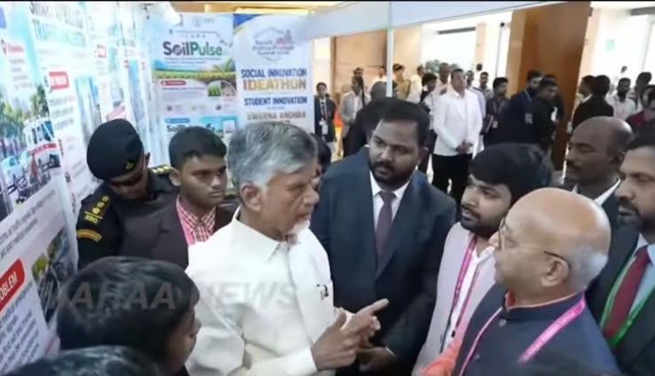 The Chief Minister discussing student ideas with the ICORG team